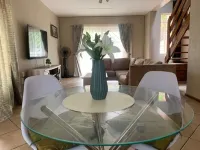 Entire 2 bedroom Duplex with wrap around garden in a secure complex