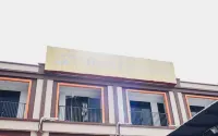 RedDoorz Plus near Sultan Hasanuddin Airport Hotel dekat Letak Toko Asesoris Tas Wilayah Central Makassa