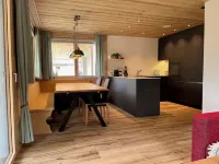 New vacation apartment in the middle of the SkiArena Andermatt Sedrun with indoor golf course
