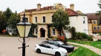 Woodland Manor Hotel - Parkplatz