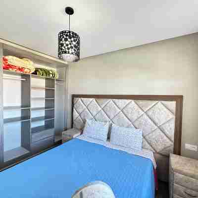 Gym / Pool. Apartment Ideal for long stays. Rooms