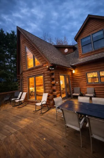 Enchanting 5-Bed/5-Bath Lakefront Log Cabin with Private Cove, Beach & Hot Tub.