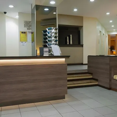 CLH Suites Domingos Ferreira Отели рядом с достопримечательностью «Южная зона»