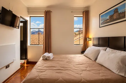 Hostal & Apartments El Triunfo - Homestays