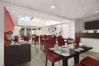 Ramada by Wyndham London Stansted Airport - breakfast