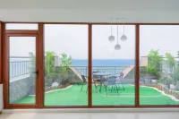 Encounter a guesthouse with a sea view.