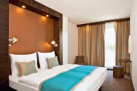 Motel One Magdeburg Hôtels à proximité de : Stadtpark Rotehorn