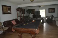 Popular large river home pool, pickelball, basketball, volleyball, nice area