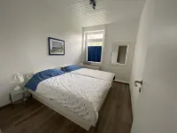Vacation apartment "Kleine Möwe" with large garden in the heart of Pilsum Hotels in der Nähe von OTTO (der Ostfriese) Leuchtturm / OTTO lighthouse