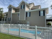 Stunning, Family sized, fully furnished home with pool at Spinnaker's Reach.