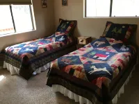 Privacy! One  & 1/2 acre with wrap around deck. Backs the National Forest.