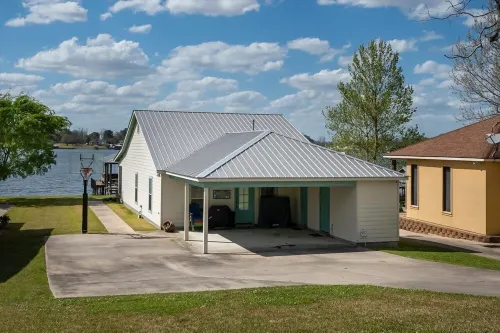 Screened porch and private pier on False River