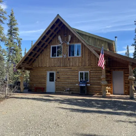 Log House on Denali Airstrip at Mile Post 229.5 of the Parks Highway.