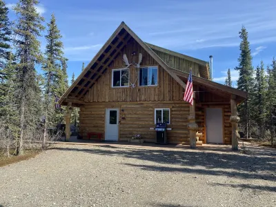 Log House on Denali Airstrip at Mile Post 229.5 of the Parks Highway.