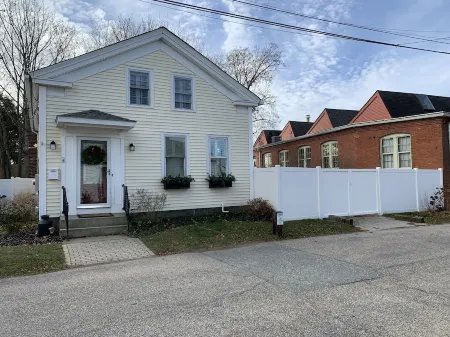 Exceptional location footsteps to beautiful downtown Mystic w/private driveway