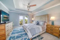 Coastal Elegance: Retreat with Heated Pool, Golf Cart, and Entertainment Haven