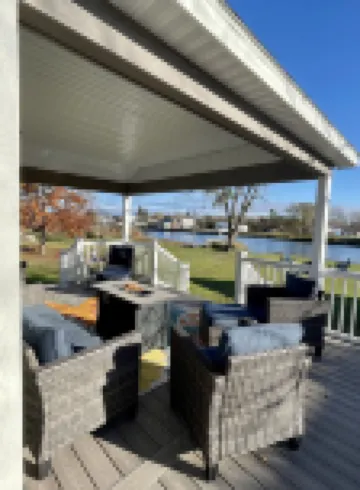 Cozy riverfront cottage with an easy beach-inspired coastal MI vibe!