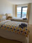 Beachside, stunning apartment with sea and harbour views