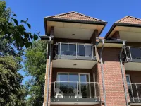 Cozy vacation apartment with dike view in Wremen Hotels in Wremen