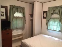 A cozy, relaxing, private cabin overlooking Sawyer Lake  WIFI, TV, AC, Heat