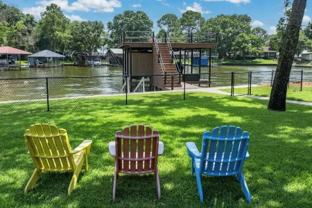 Dock, Fire Pit & Fenced Yard at Lakefront Retreat