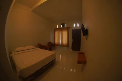 Singgala Hotel Syariah Hotel dekat PERBATASAN KEC. MATUR-KEC. PALEMBAYAN