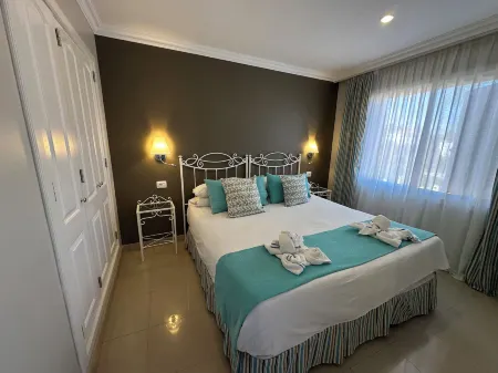 Coral La Quinta Park Suites Отели в г. Асентехо