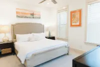 5 Mins to Beach Shared Pool Covered Deck Bikes Heron Cottage by AvantStay