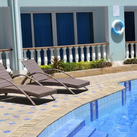 Cowrie Shell Beach Apartments Official