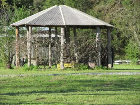 Restored rock house with hot tub and beautiful private deck.