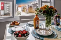 Stylish Beachside Condo on Commercial - Dog-Friendly, Parking, Prime Location