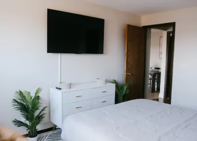 Modern Kitchen and Cozy Balcony - Inviting Urban Retreat Hotels near Terminal 1 Station