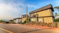 Jeju Kkot Hyang gi Badasori Pension Hoteles cerca de Jardín Spirited
