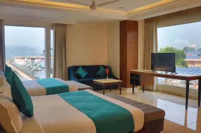 Green Hotel - Behind Parmarth Niketan Hotels near Gaura Devi Chowk
