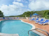 Dickenson Bay Cottages - piscine