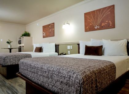 Family Garden Inn & Suites