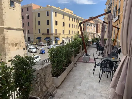 7 Bell's House Отели рядом с достопримечательностью «Civitavecchia Port»