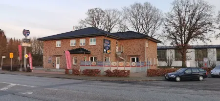 Motel am Outletcenter Отели в г. Бад-Брамштедт