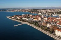Pied-à-Terre by Belmont Realty