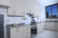 PrimeNest - 3 bedroom Apartment
