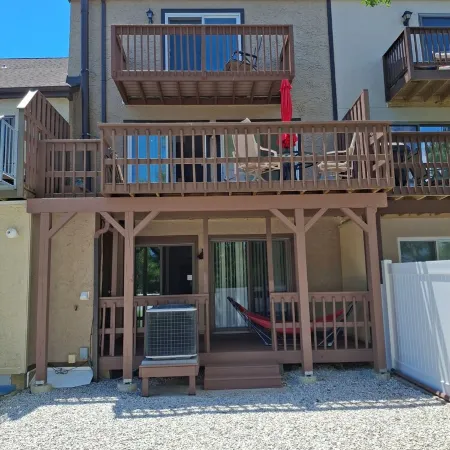 nestled against the dunes, south end beach block on cul-de-sac