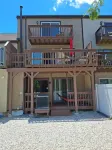 nestled against the dunes, south end beach block on cul-de-sac