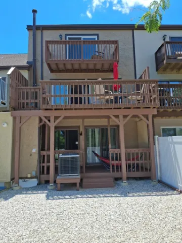 nestled against the dunes, south end beach block on cul-de-sac