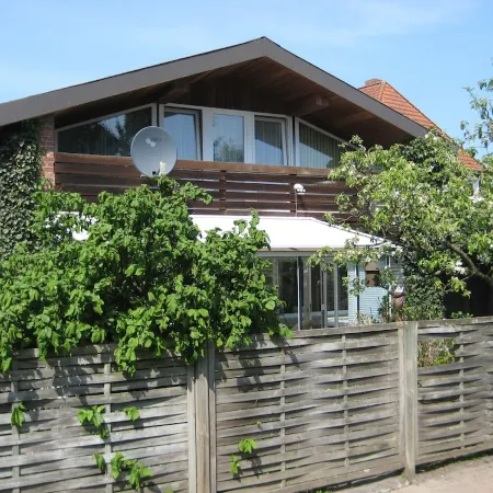 large apartment near the North Sea with conservatory, fireplace, sauna