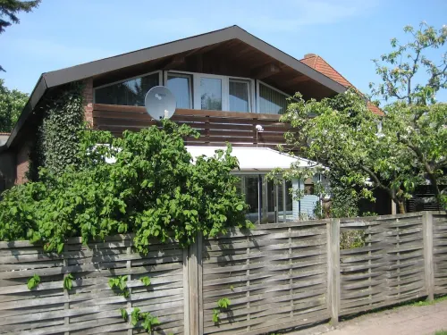 large apartment near the North Sea with conservatory, fireplace, sauna