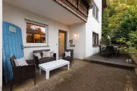 Andina's apartment, central and right on the forest