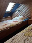Sunny holiday home with a cozy sleeping loft, idyllically located in the garden.