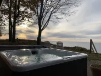 “Red Cottage” Manistee Lake Michigan Beach house w/new stairs to private beach