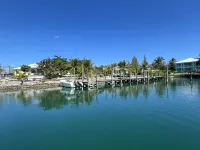 Yellow House with Dock on Deep Water Canal and Dock Power