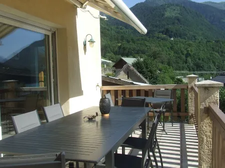 Lovely village house with a view of lake and mountain VAUJANY on the other side Alpe d'Huez